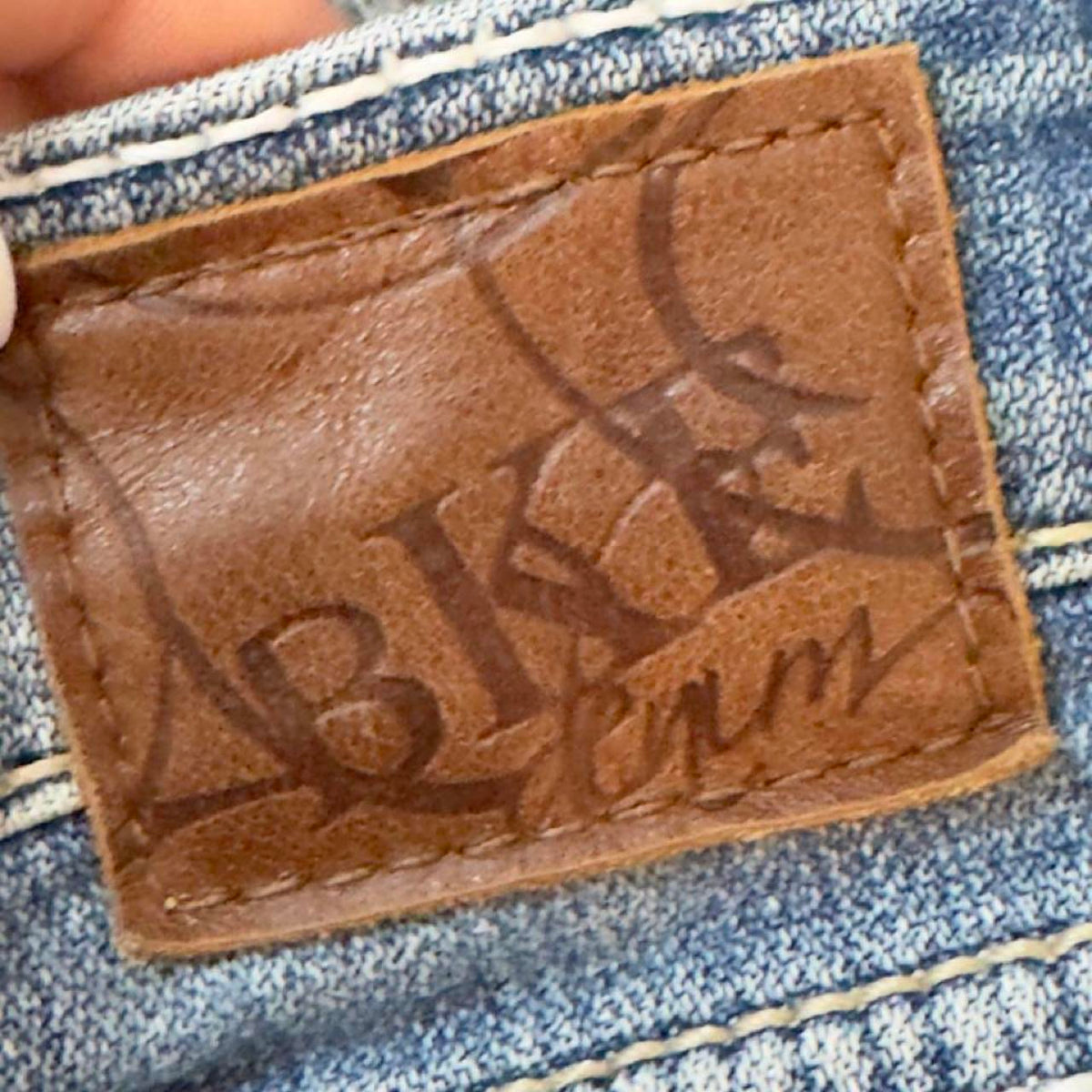 Low rise bootcut blue jeans with a distressed look #bootcut #distressed #y2k