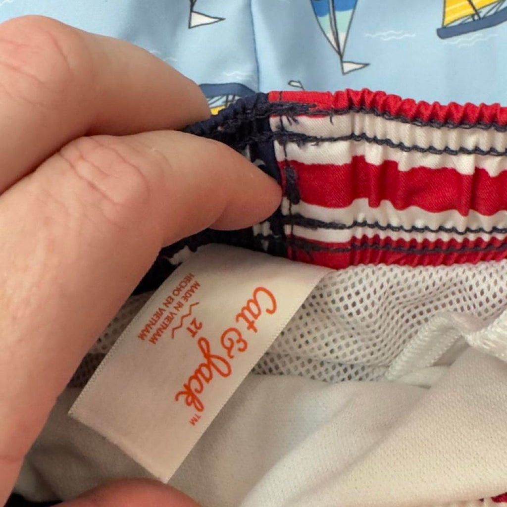 3 assorted pack of boys swim trunks with sailboats, stars, stripes, and sharks. Size 4-6 years. #swimwear #boys - Image 3