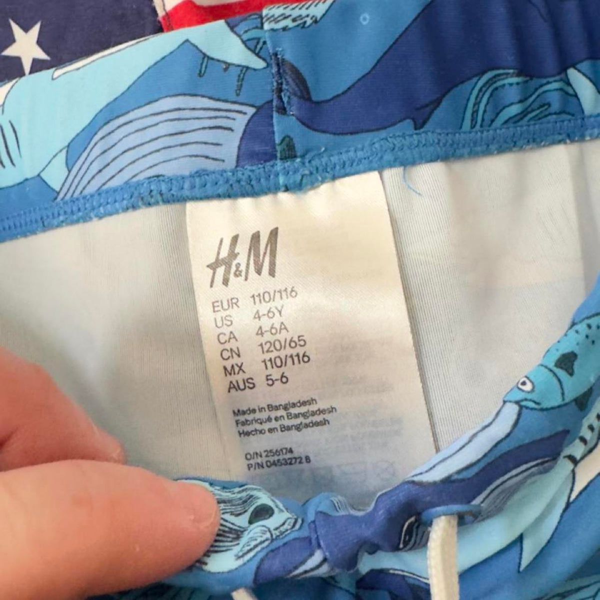 3 assorted pack of boys swim trunks with sailboats, stars, stripes, and sharks. Size 4-6 years. #swimwear #boys - Image 2