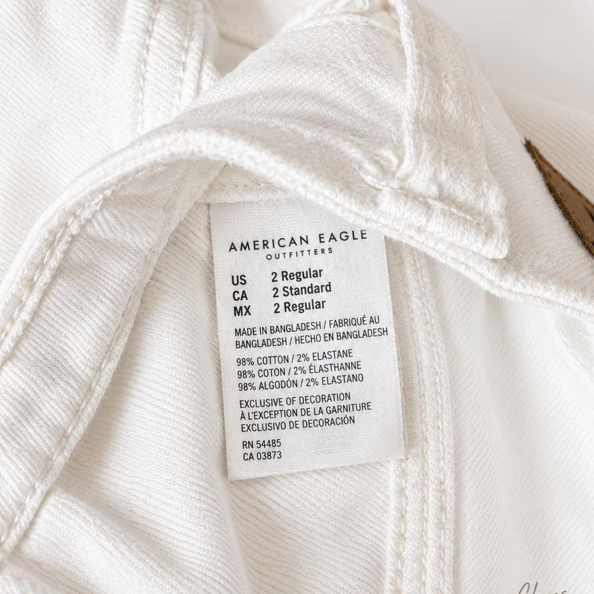 American Eagle White Distressed Knee Skinny Jeans - Image 4